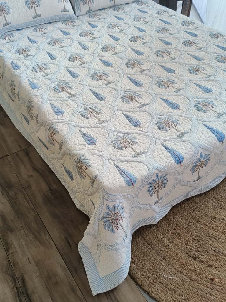 Palm quilted bedcover