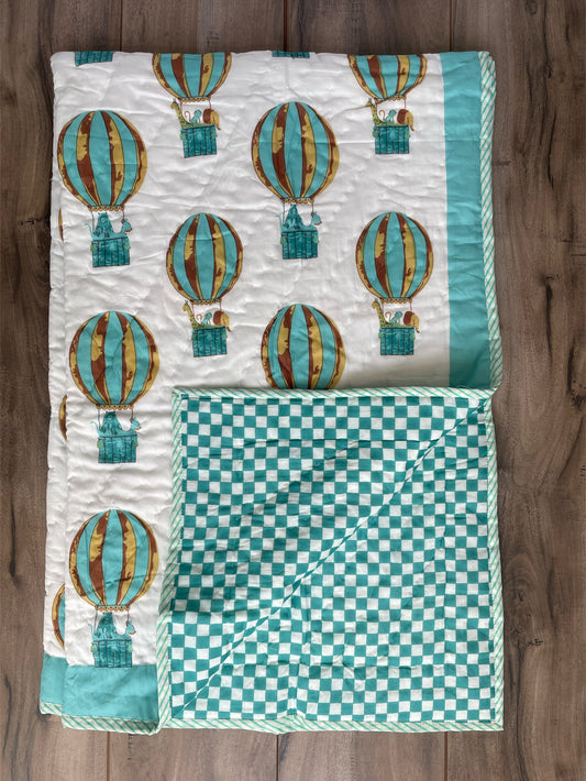 Hot air balloon print mulmul baby quilt